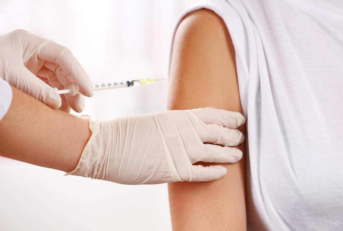 A woman recieving a vitamin injections Essex